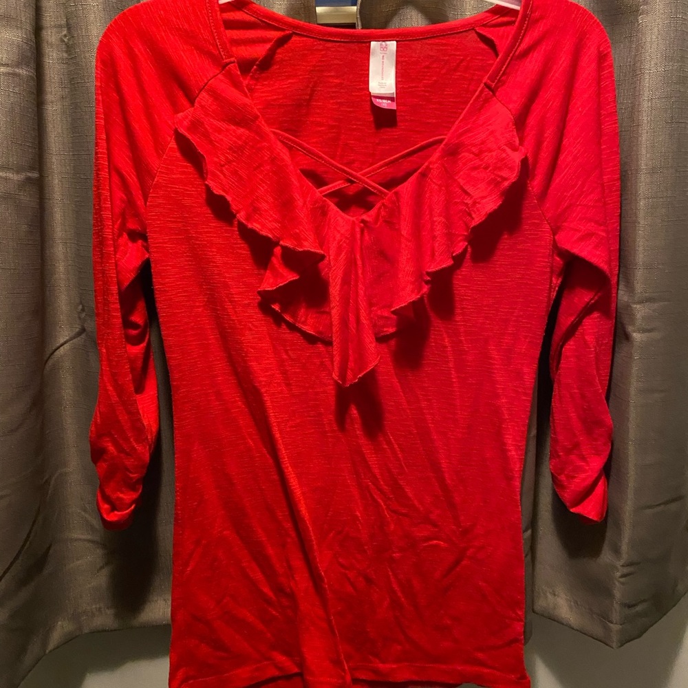 Super. It’s dressy 3 quarter sleeve shirt.